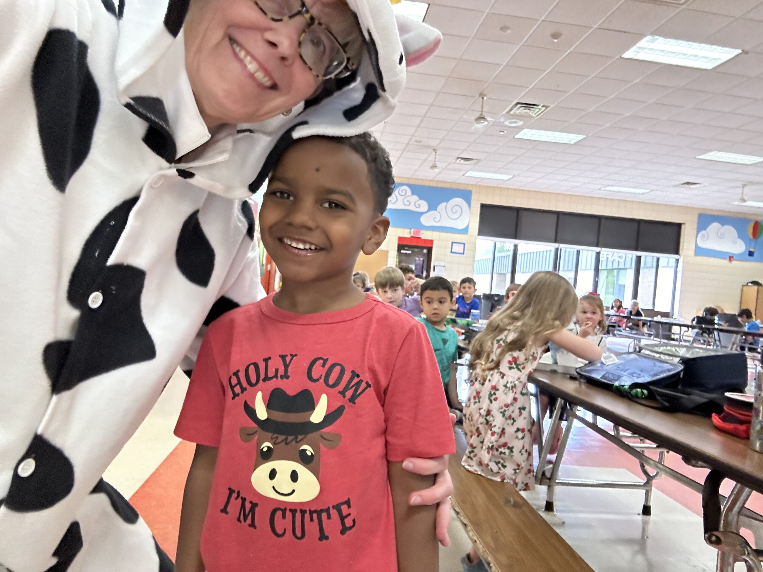 Principal with student